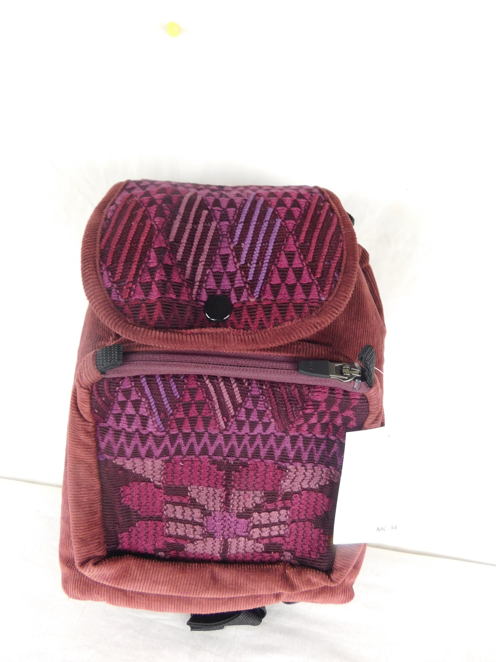  Mini backpack in corduroy with hand brocaded accents Description