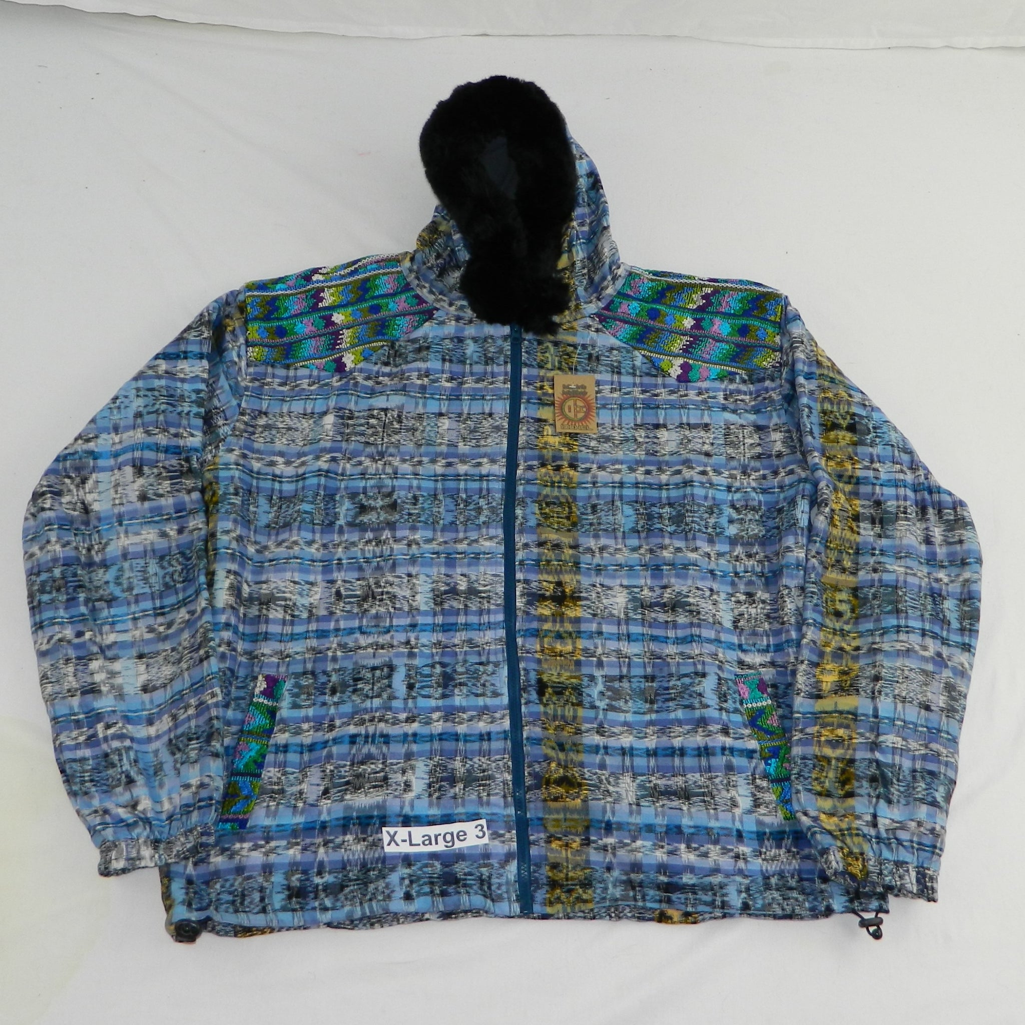 Hooded  jacket in native Ikat and brocade fleece lined with fur hood