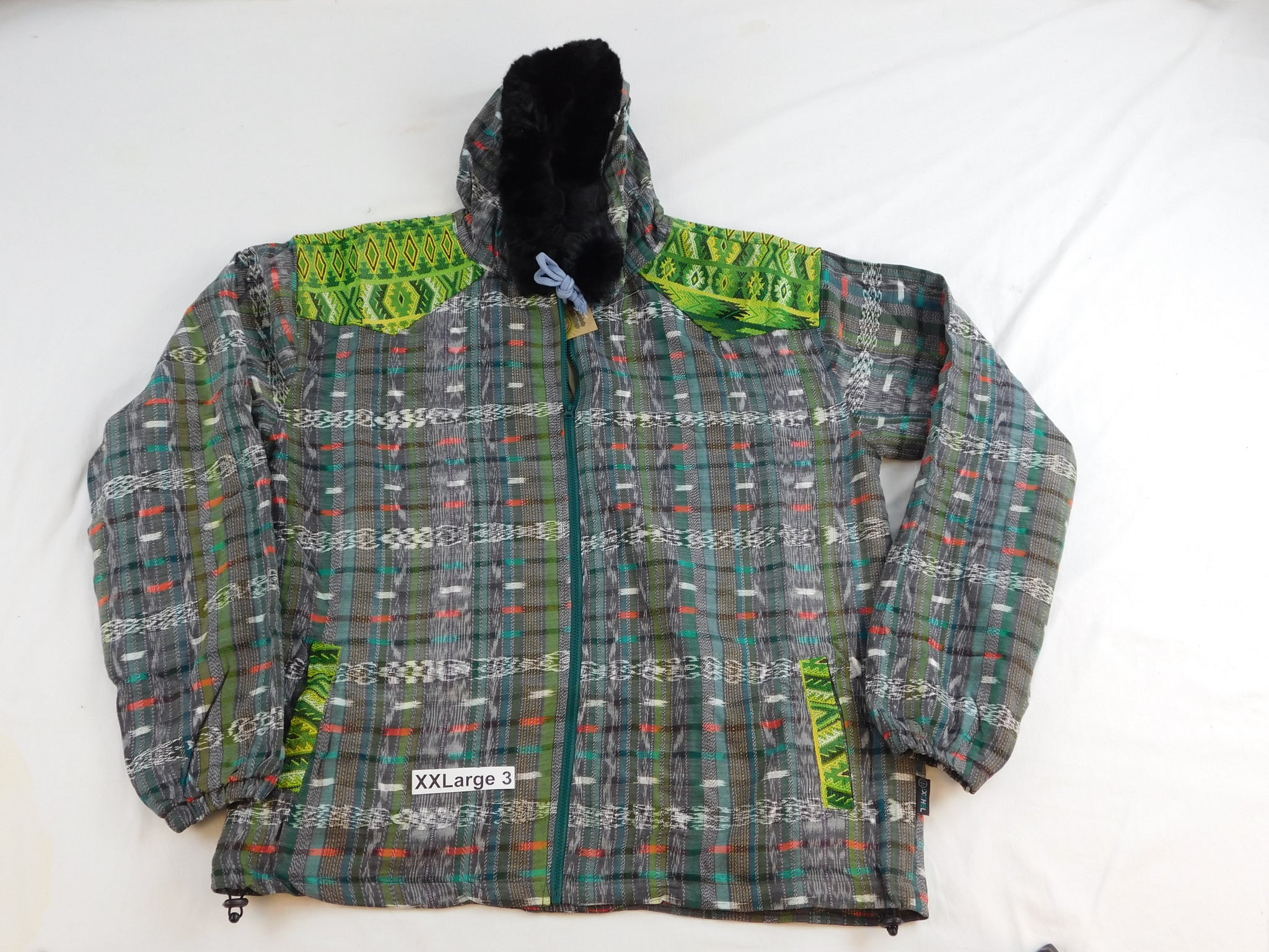 Hooded  jacket in native Ikat and brocade fleece lined with fur hood